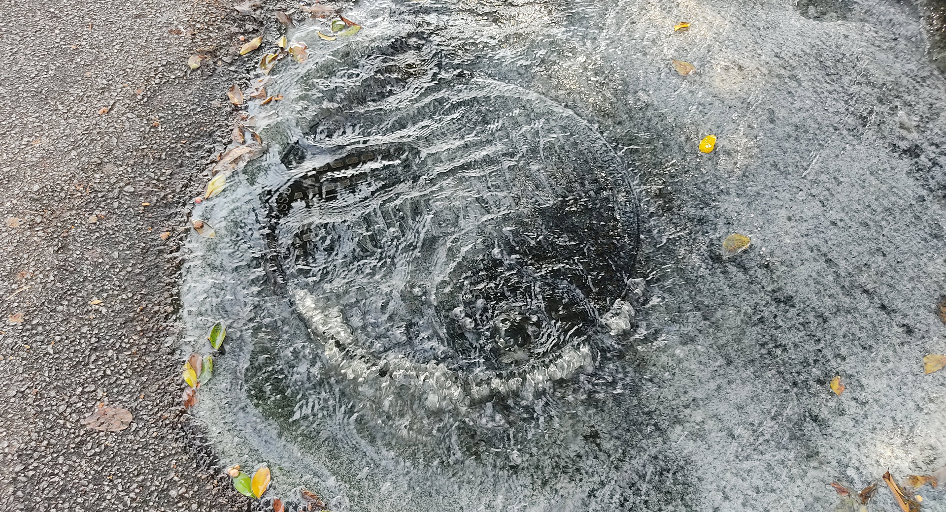 Water overflowing from a drain
                        